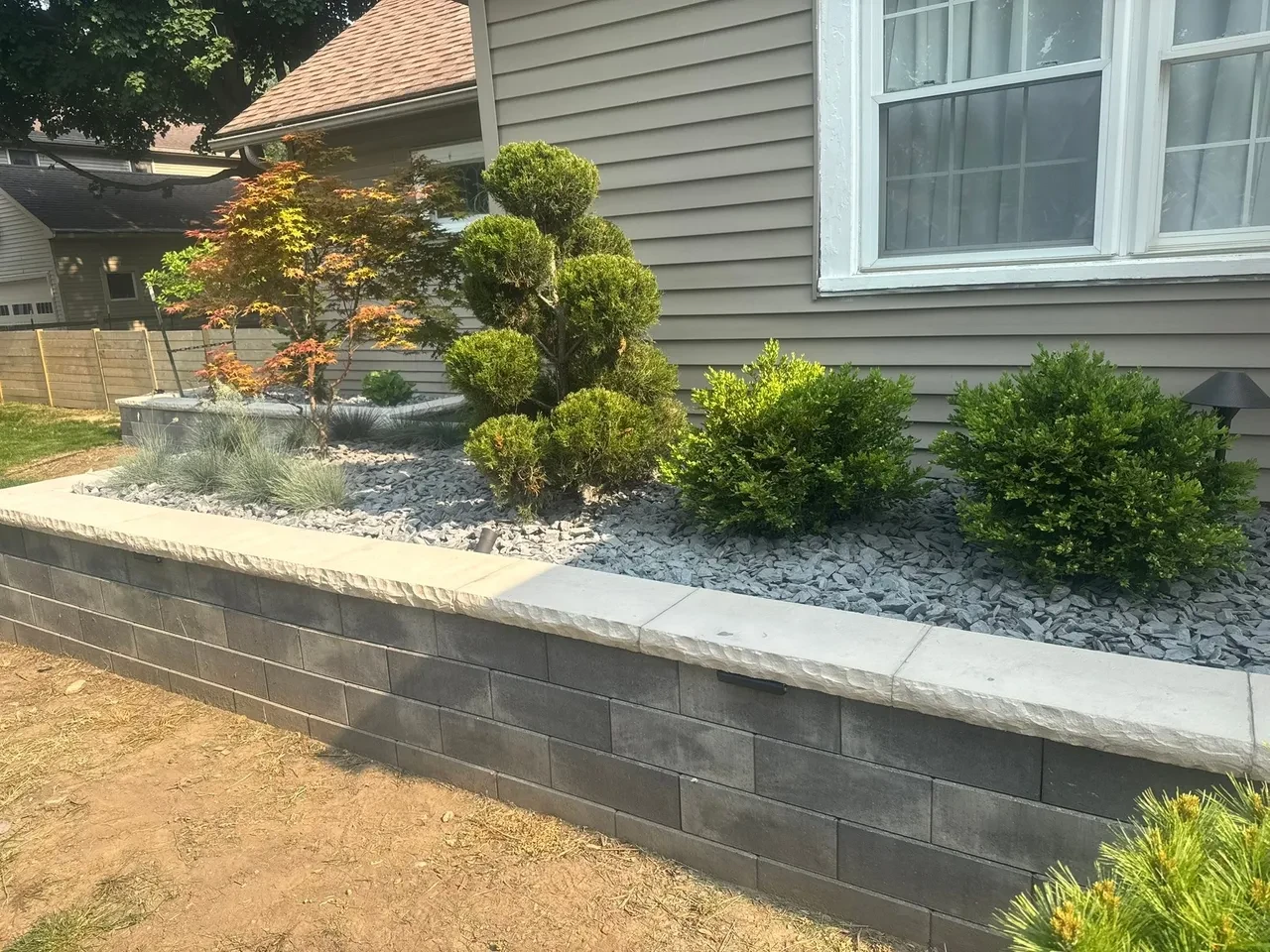 Retaining wall stone block